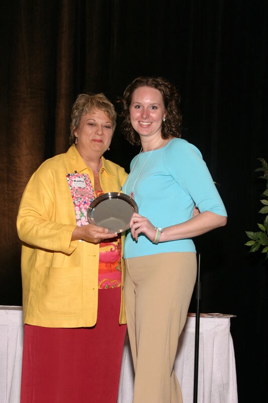 Kathy Williams and Unidentified With Award at Convention Sisterhood Luncheon Photograph 4, July 8-11, 2004 (Image)