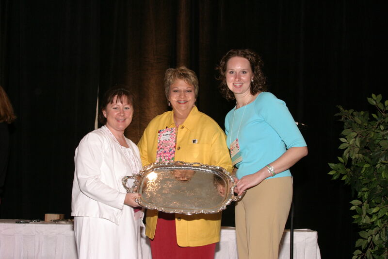 Kathy Williams and Two Unidentified Phi Mus With Award at Convention Sisterhood Luncheon Photograph, July 8-11, 2004 (Image)