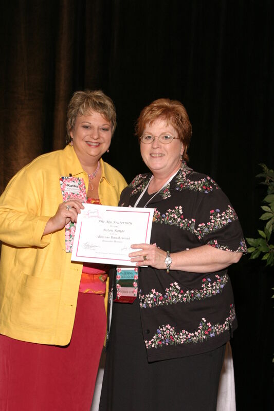 July 8-11 Kathy Williams and Baton Rouge Alumna With Certificate at Convention Sisterhood Luncheon Photograph Image