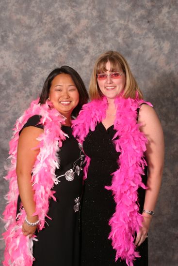 Two Unidentified Phi Mus in Feather Boas Convention Portrait Photograph, July 11, 2004 (image)