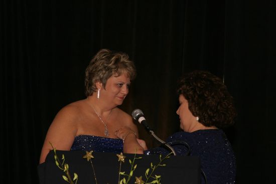 Mary Jane Johnson Speaking to Kathy Williams at Convention Carnation Banquet Photograph 5, July 11, 2004 (image)