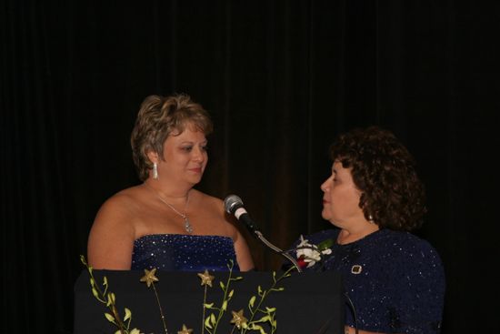 Mary Jane Johnson Speaking to Kathy Williams at Convention Carnation Banquet Photograph 4, July 11, 2004 (image)