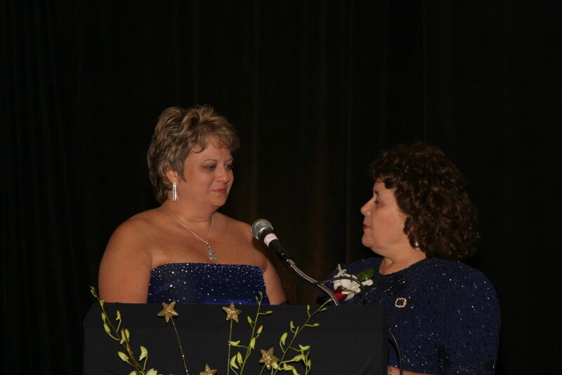 Mary Jane Johnson Speaking to Kathy Williams at Convention Carnation Banquet Photograph 4, July 11, 2004 (Image)