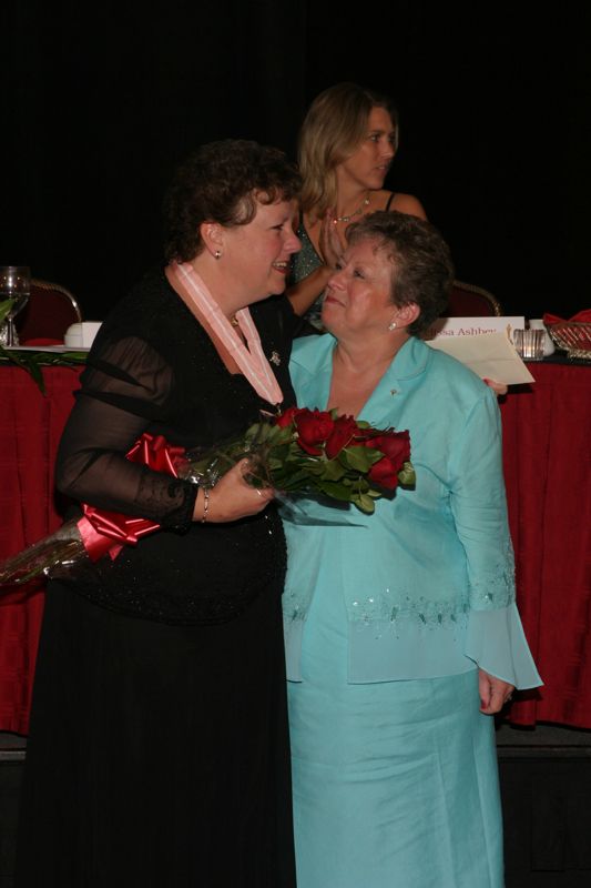 July 11 Audrey Jankucic and Unidentified Phi Mu Hugging at Convention Carnation Banquet Photograph 5 Image