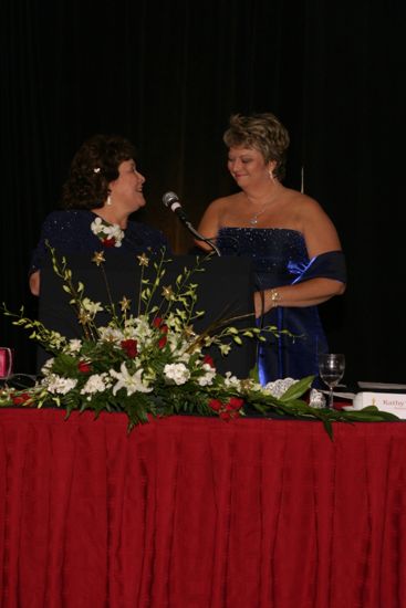 Mary Jane Johnson Speaking to Kathy Williams at Convention Carnation Banquet Photograph 2, July 11, 2004 (image)