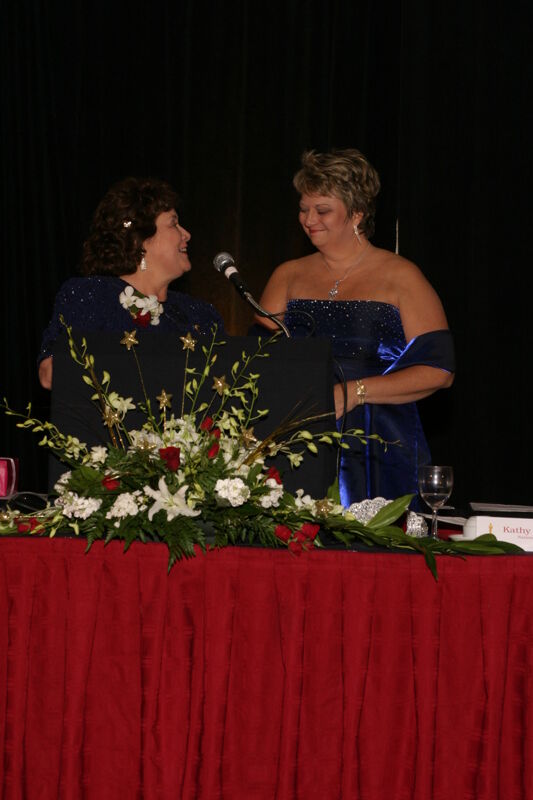 Mary Jane Johnson Speaking to Kathy Williams at Convention Carnation Banquet Photograph 2, July 11, 2004 (Image)