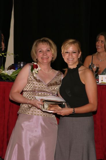 Robin Fanning and Unidentified With Award at Convention Carnation Banquet Photograph, July 11, 2004 (image)