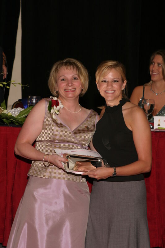Robin Fanning and Unidentified With Award at Convention Carnation Banquet Photograph, July 11, 2004 (Image)