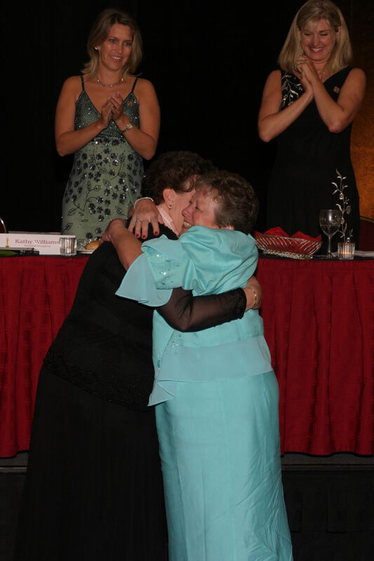 July 11 Audrey Jankucic and Unidentified Phi Mu Hugging at Convention Carnation Banquet Photograph 2 Image