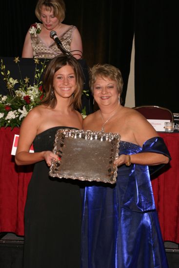 Kathy Williams and Unidentified With Award at Convention Carnation Banquet Photograph 2, July 11, 2004 (image)