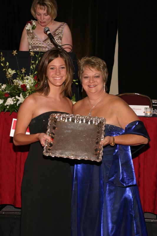 Kathy Williams and Unidentified With Award at Convention Carnation Banquet Photograph 2, July 11, 2004 (Image)