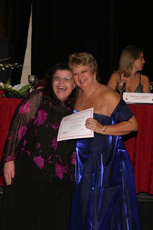 Kathy Williams and Kansas City Alumna With Certificate at Convention Carnation Banquet Photograph, July 11, 2004 (Image)