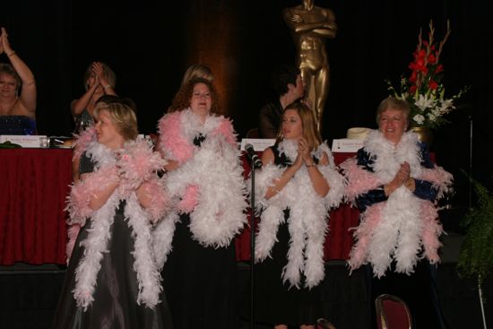 Choir in Feather Boas at Convention Carnation Banquet Photograph 3, July 11, 2004 (image)