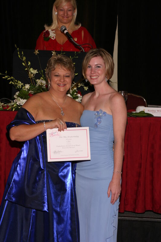 Kathy Williams and Chi Chapter Member With Certificate at Convention Carnation Banquet Photograph, July 11, 2004 (Image)