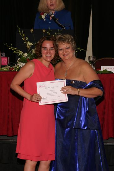 Kathy Williams and Boston Alumna With Certificate at Convention Carnation Banquet Photograph, July 11, 2004 (image)