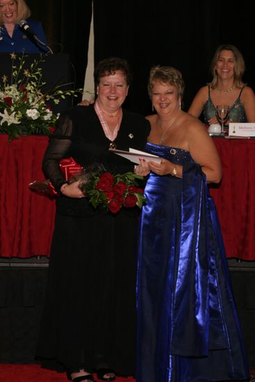 Kathy Williams and Audrey Jankucic With Award at Convention Carnation Banquet Photograph, July 11, 2004 (image)