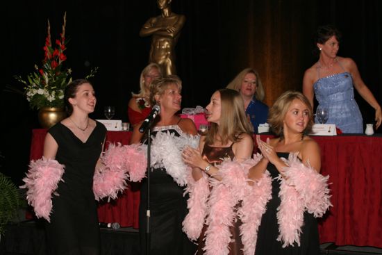 Choir in Feather Boas at Convention Carnation Banquet Photograph 4, July 11, 2004 (image)