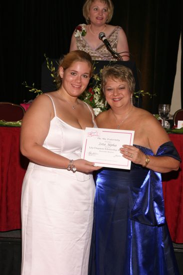 Kathy Williams and Zeta Alpha Chapter Member With Certificate at Convention Carnation Banquet Photograph, July 11, 2004 (image)