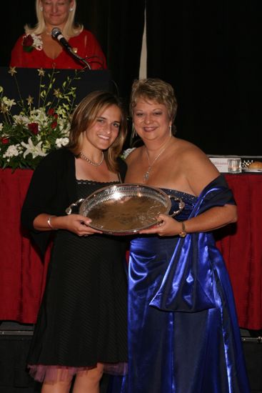 Kathy Williams and Unidentified With Award at Convention Carnation Banquet Photograph 11, July 11, 2004 (image)