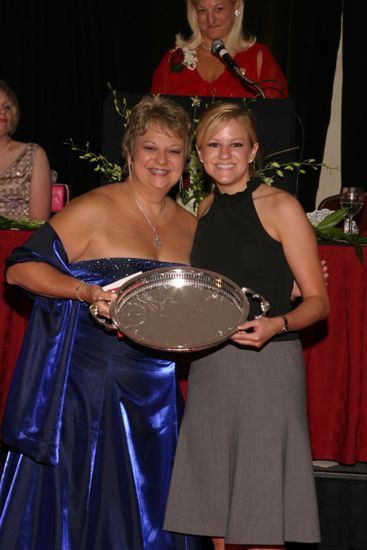 Kathy Williams and Unidentified With Award at Convention Carnation Banquet Photograph 12, July 11, 2004 (image)