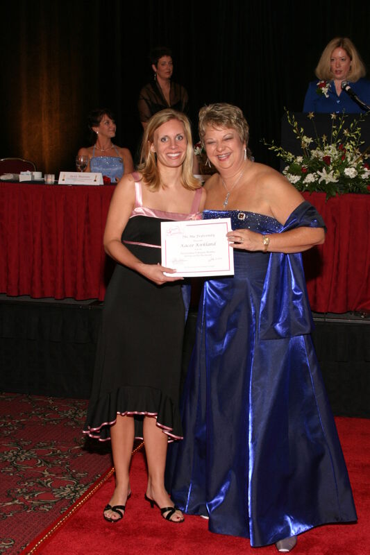 July 11 Kathy Williams and Kacee Kirkland With Certificate at Convention Carnation Banquet Photograph Image