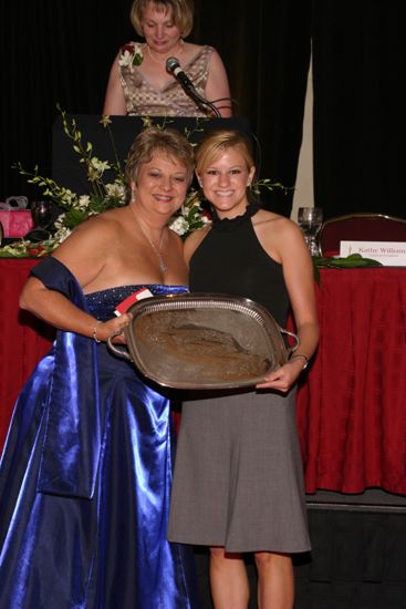 Kathy Williams and Unidentified With Award at Convention Carnation Banquet Photograph 4, July 11, 2004 (image)