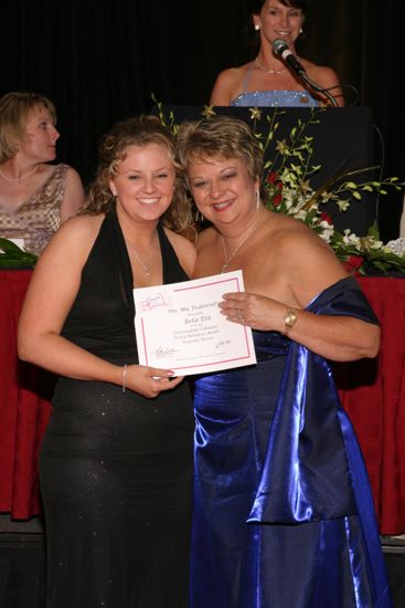 Kathy Williams and Beta Eta Chapter Member With Certificate at Convention Carnation Banquet Photograph, July 11, 2004 (image)