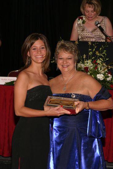 Kathy Williams and Unidentified With Award at Convention Carnation Banquet Photograph 15, July 11, 2004 (image)