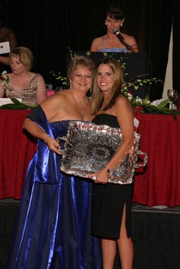 Kathy Williams and Unidentified With Award at Convention Carnation Banquet Photograph 5, July 11, 2004 (image)