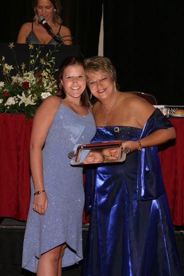 Kathy Williams and Unidentified With Award at Convention Carnation Banquet Photograph 9, July 11, 2004 (image)