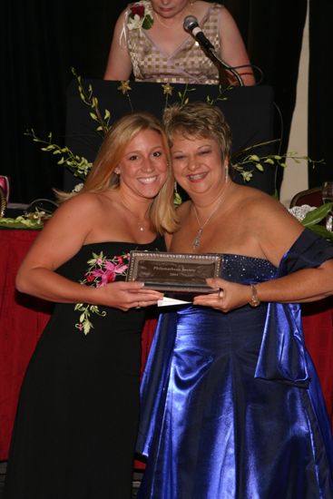 Kathy Williams and Unidentified With Award at Convention Carnation Banquet Photograph 17, July 11, 2004 (image)