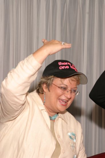 Kathy Williams Wearing Hat at Convention Officers' Party Photograph 1, July 7, 2004 (image)