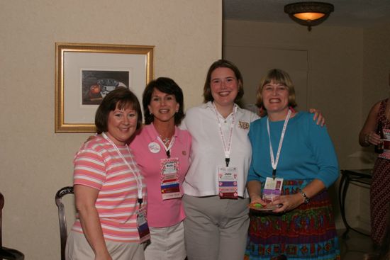 Benoit, Monnin, Meyer, and Unidentified at Convention Officers' Party Photograph, July 7, 2004 (image)