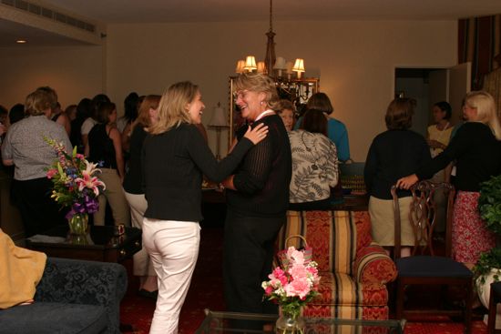 Phi Mus Socializing at Convention Officers' Party Photograph, July 7, 2004 (image)