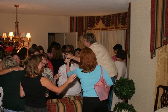 Kathy Williams Making a Toast at Convention Officers' Party Photograph 2, July 7, 2004 (image)