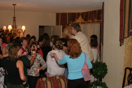 Kathy Williams Making a Toast at Convention Officers' Party Photograph 1, July 7, 2004 (image)