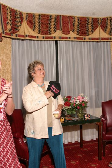 Kathy Williams With Hat at Convention Officers' Party Photograph 1, July 7, 2004 (image)