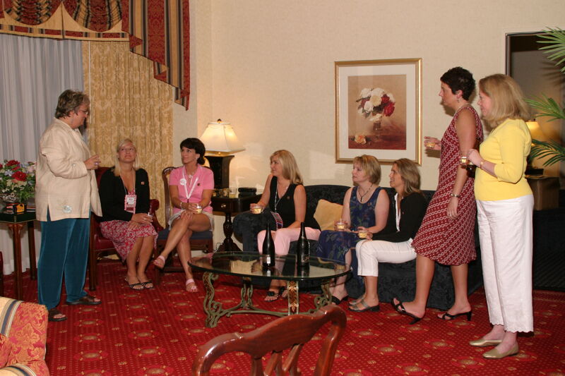 Jen Wooley and National Council Socializing at Convention Officers' Party Photograph 3, July 7, 2004 (Image)