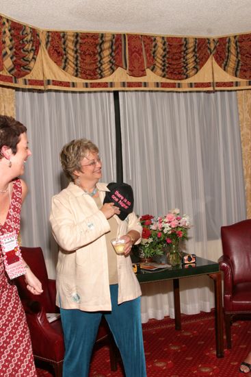 Kathy Williams With Hat at Convention Officers' Party Photograph 2, July 7, 2004 (image)