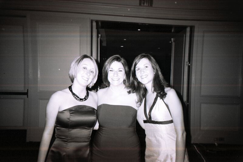 Shelly Chappuis and Two Unidentified Phi Mus at Convention Carnation Banquet Photograph, July 11, 2004 (Image)
