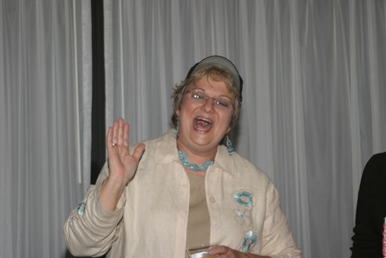 Kathy Williams Laughing at Convention Officers' Party Photograph 3, July 7, 2004 (image)