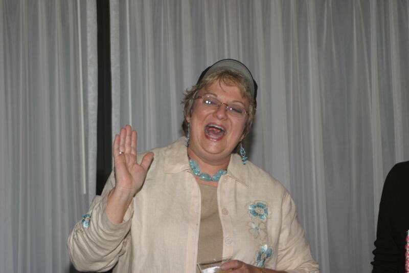 Kathy Williams Laughing at Convention Officers' Party Photograph 3, July 7, 2004 (Image)