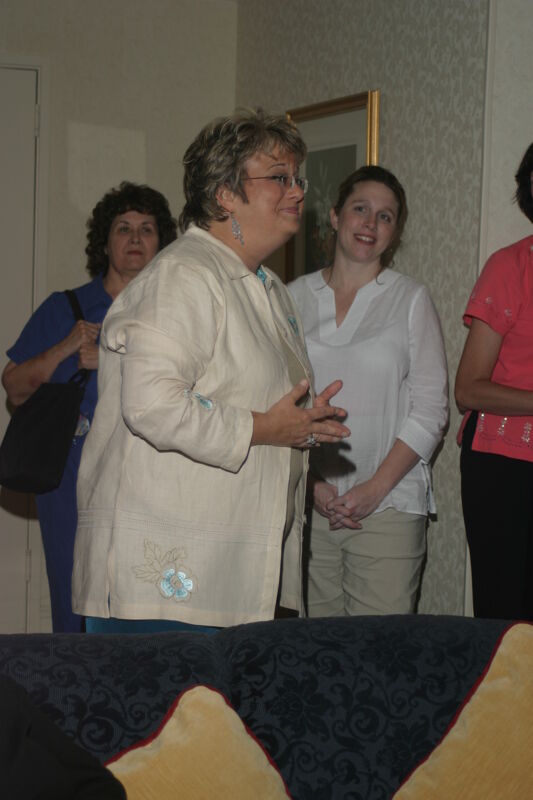 Kathy Williams Socializing at Convention Officers' Party Photograph 3, July 7, 2004 (Image)