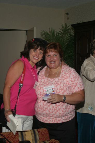 Becky School and Unidentified at Convention Officers' Party Photograph 1, July 7, 2004 (image)