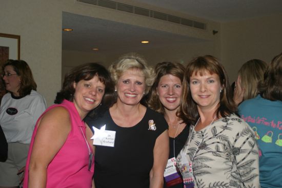 Unidentified, Garland, Day, and Bulger at Convention Officers' Party Photograph, July 7, 2004 (image)