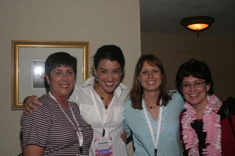 Jennifer Copeland and Three Unidentified Phi Mus at Convention Officers' Party Photograph, July 7, 2004 (Image)