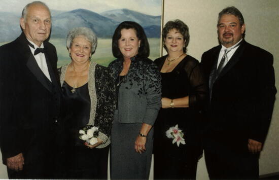 Three Phi Mus and Husbands at Carnation Banquet Photograph, July 4-8, 2002 (image)