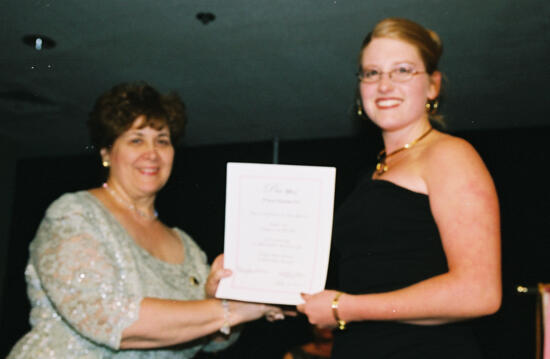 Mary Jane Johnson and Alpha Nu Chapter Member With Certificate at Convention Photograph 1, July 4-8, 2002 (image)