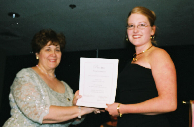 Mary Jane Johnson and Alpha Nu Chapter Member With Certificate at Convention Photograph 1, July 4-8, 2002 (Image)