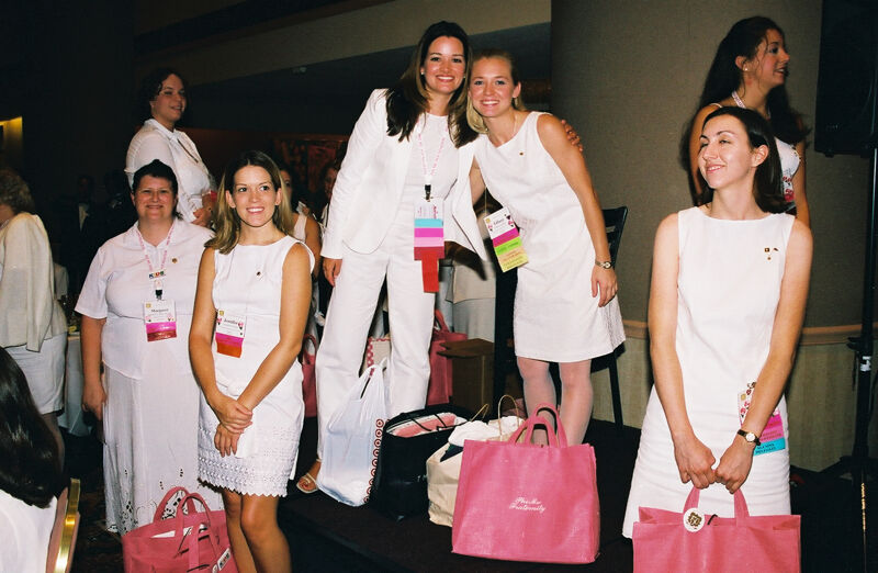 Seven Phi Mus With Pink Bags at Convention Photograph, July 4-8, 2002 (Image)